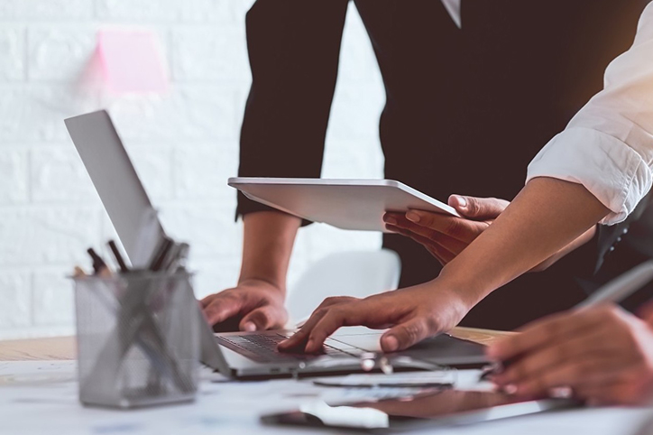 Business people are analyzing and planning business. Business Strategy Consulting